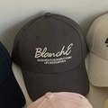 Dark grey baseball cap featuring 3D letter embroidery and a curved brim for outdoors - Gray