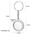 Portachiavi rotondo in metallo argento girevole, 42x37mm con anello da 32mm di diametro - Etichetta Piatta X-762 / Argento