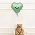 Close-up of a green heart-shaped smiley face balloon for festive party scene decoration - Heart + Smile Sticker / Vintage Green