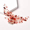 Handmade bridal hair comb with red crystal beads and gold metal leaf details on white base - Red