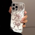Detail showing pink ribbon patterns and calligraphy on transparent iPhone Pro case - Silver Two Pink Ballet Bows / iPhone 17 Air