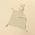 Detailed texture of beige cotton gauze baby comforter with bunny ears and knotted corners - 30*30 cm / Printed Khaki