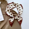 Brown floral narrow silk scarf tied as a bow on a professional shirt for women - Caramel Small Floral