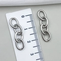 Silver four-link metal extension chain for DIY crafts shown next to a measuring ruler - 27x7mm (1.0g) / Antique Silver