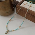 Natural tiger eye beaded necklace with light blue stones and gold metal accents - Sky Blue Oval Pendant Beaded Necklace XL0494