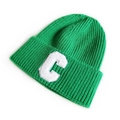 Green knit beanie featuring a bold white towel-embroidered letter C on the cuff - Green
