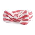 Detalle de la diadema de forro polar coral a rayas rosas y blancas con textura suave - Rayas Rosa Blanco
