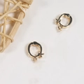 Detailed macro view of two golden baroque pearl lobster clasps for DIY jewelry making - 1 Piece Universal Clasp