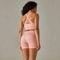 Pink seamless knitted yoga set with cross back sports bra and high waist shorts - S / Top And Bottom / Cross Bra + Shorts / Light Pink
