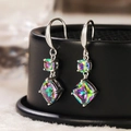 Elegant silver drop earrings with iridescent square crystals on a dark pedestal - E614 Round and Square Stones / Colorful