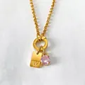 Stainless steel gold necklace with letter W pendant tag and sparkling pink crystal - Letter W