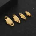 Dettaglio di chiusure ovali in acciaio inossidabile dorato in quattro misure graduate - 6mm / Oro