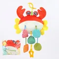 Plush red crab stroller toy with colorful sensory hanging pendants and C-clip hook - Crab Drawstring Pull-and-Play Style