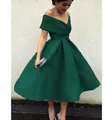 Elegant off-the-shoulder dark green satin cocktail dress with flared A-line skirt - US size 14W / Dark Green