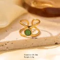 Gold titanium steel ring with green stone and X-shaped open band, 20.2mm diameter - Adjustable Open / Gold Double Cross Band with Round Green Cat's Eye Stone (JOM25013)