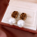 Macro shot of vintage leopard print earrings with large pearls in a red jewelry gift box - Silver Pin - Brown Leopard & White Pearl