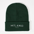 Close-up of white MILANO ITALY embroidery on a dark green knitted beanie hat - Dark Green