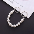 Detail of beaded pearl chain for clog shoes and bags featuring silver spring rings - Gradient Pearl Chain