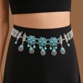 Detail of bohemian silver coin waist chain with turquoise accents and tassel pendants - Blue Four-leaf Flower / Silver / 17.5