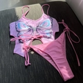 Detailed flat lay of pink butterfly bikini set with drawstring center and side ties - S / Pink