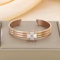 Detail of rose gold clover bracelet featuring white mother-of-pearl petals and crystals - Rose Gold Shell (KB103118-K)