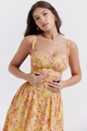 Detail of yellow floral sundress featuring button accents and cinched waist design - S / Yellow
