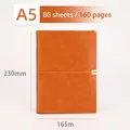 A5 business notebook with orange PU leather cover and elastic strap with metal buckle - Orange