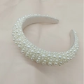 Elegant wide headband featuring layered white imitation pearls on a soft fabric base - White Dense Imitation Pearl Style