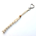 Detail of bohemian handmade macrame bag charm with cotton rope and heart metal clasp - Beige Woven Lipstick Mesh Bag