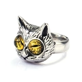 Macro detail of vintage owl ring featuring retro silver finish and realistic yellow eyes - US 6 / Steel Base Yellow Gemstone