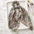 Pink paisley satin scrunchie with scarf ribbon on a white tray with floral accents - Pink Paisley