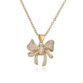 Gouden ketting met strikhanger en sprankelende zirkonia op een fijne O-ketting - Goud