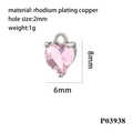Macro detail of a small heart pendant with pink zircon and rhodium plated copper - Silver/Pink Zircon