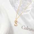Detail of gold letter S necklace with micro-pave zircon on delicate O-chain link - Letter S
