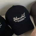 Black baseball cap with white 3D letter embroidery and classic structured crown - Navy Blue