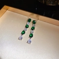 Elegant silver tassel earrings with green oval gemstones and clear drop crystals - Green Tassel