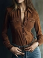 Detail of brown faux suede shirt showing soft texture, utility pockets, and metal buttons - Coffee
