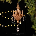Glittery gold chandelier Christmas ornament with teardrop crystal beads hanging on tree - Gold Crystal Chandelier
