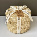 Macro detail of hand-woven straw gift box featuring cream ribbon and pearl tag - White Bronzing (Self-tie) / Small (Dia 14*H 14cm)