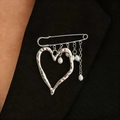 Exaggerated silver liquid lava heart brooch with pearl charms on black blazer lapel - White K (Heart Tassel)