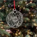 Vintage 2024 Christmas tree ornament with intricate metal hollow pattern and red string - Year 2024