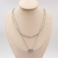 Collana a due strati in acciaio argento con catena a graffetta e pendente a molla - Argento