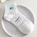 Calcetines blancos de algodón con bordado NA verde y embalaje de papel de calidad - Talla única / Blanco