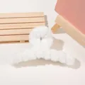 Close-up of a large white plush hair claw clip showing soft faux fur texture for women - 14cm Large Plush Claw - Creamy White