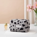Gray leopard print plush octagonal makeup bag with LOVE YOUTH text on pink background - Gray