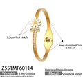 Detalle de la pulsera de acero inoxidable dorado con una margarita y cristales en T - Z551-Oro Margarita