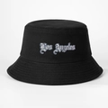 Classic black cotton bucket hat with white Los Angeles embroidery on a plain background - Black