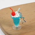 Blue soda milkshake keychain with cream, cherry, and star pendant on wooden background - Peacock Blue - Star Hook
