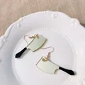 Creatieve spiegel acryl keukenmes oorbellen met zwarte handvaten en goudhaakjes - Goud