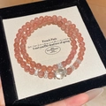 Elegant strawberry quartz double-strand bracelet presented in a black velvet jewelry box - Style 28 (Double Wrap) / Long Style (6mm) / Pink
